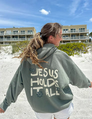 Jesus Holds It All Unisex Hoodie